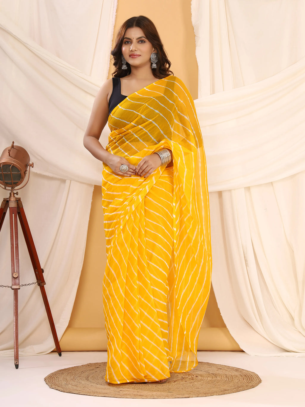 Turmeric Yellow Nazmin Chiffon Saree with Hand Tied Leheriya