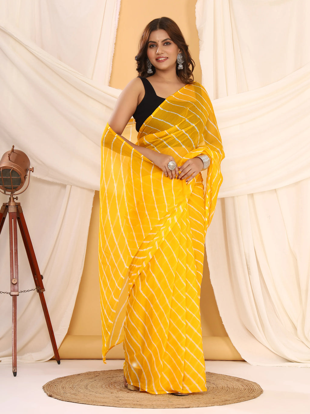 Turmeric Yellow Nazmin Chiffon Saree with Hand Tied Leheriya