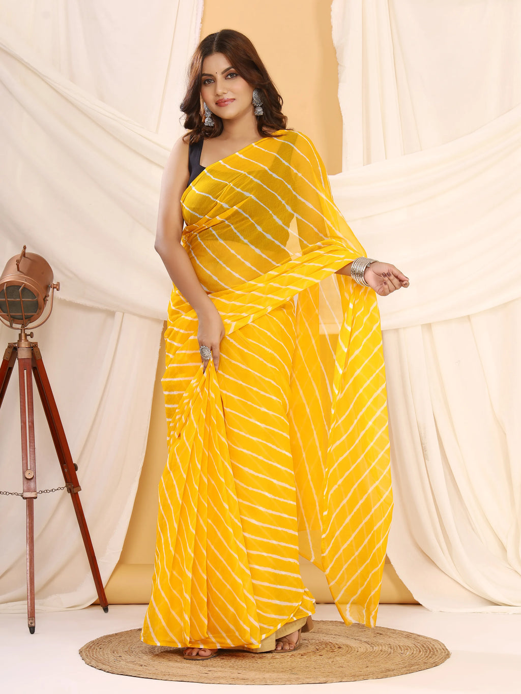 Turmeric Yellow Nazmin Chiffon Saree with Hand Tied Leheriya