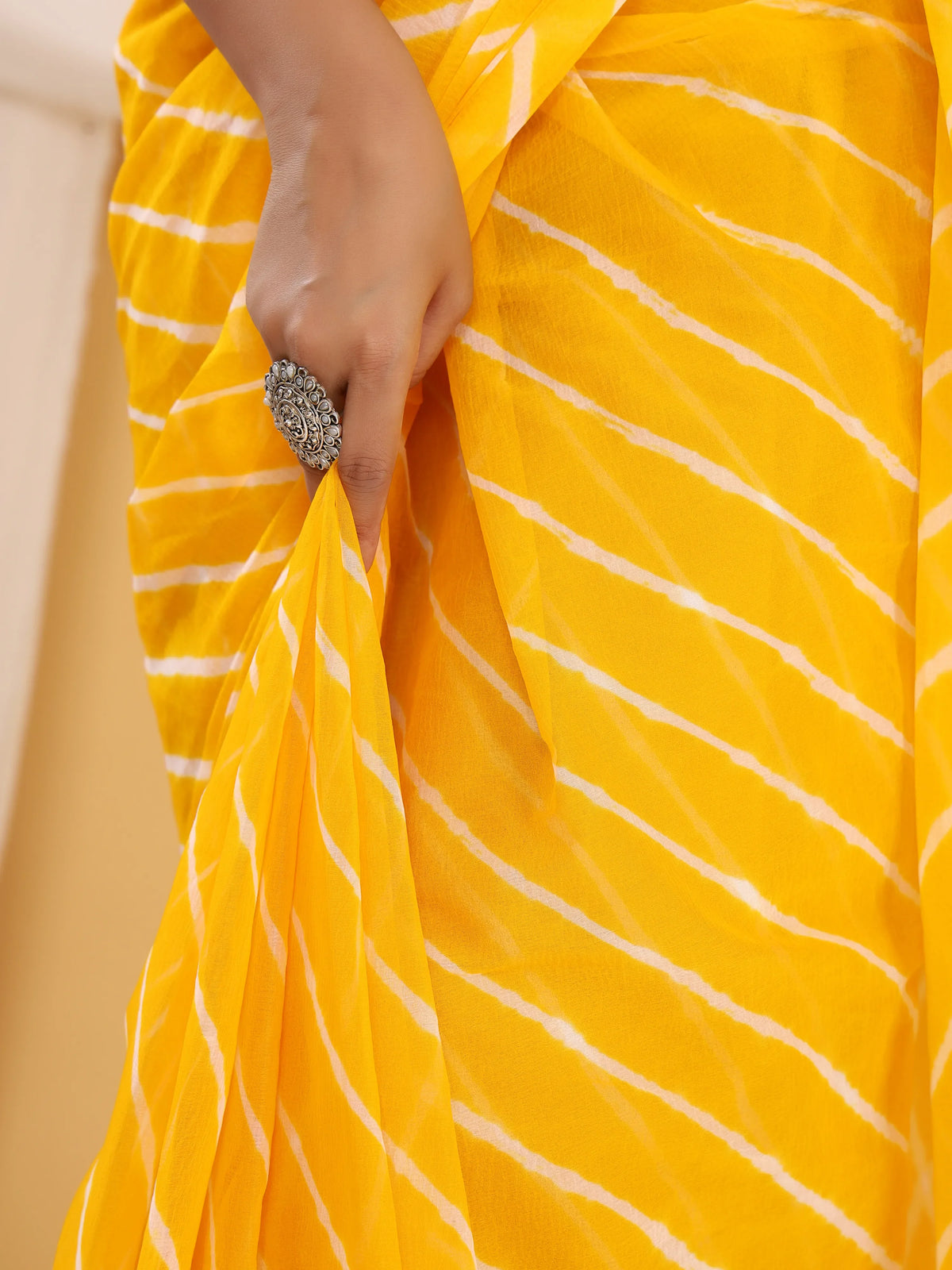 Turmeric Yellow Nazmin Chiffon Saree with Hand Tied Leheriya