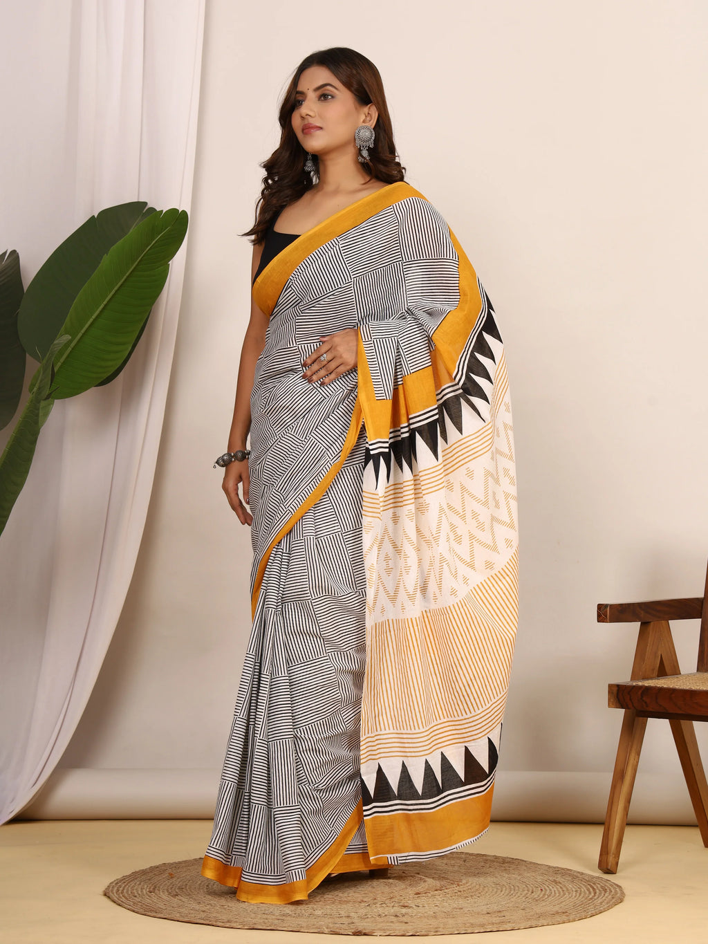 Pure Cotton White and Black Saree with Mustard Accents and Bold Geometric Print