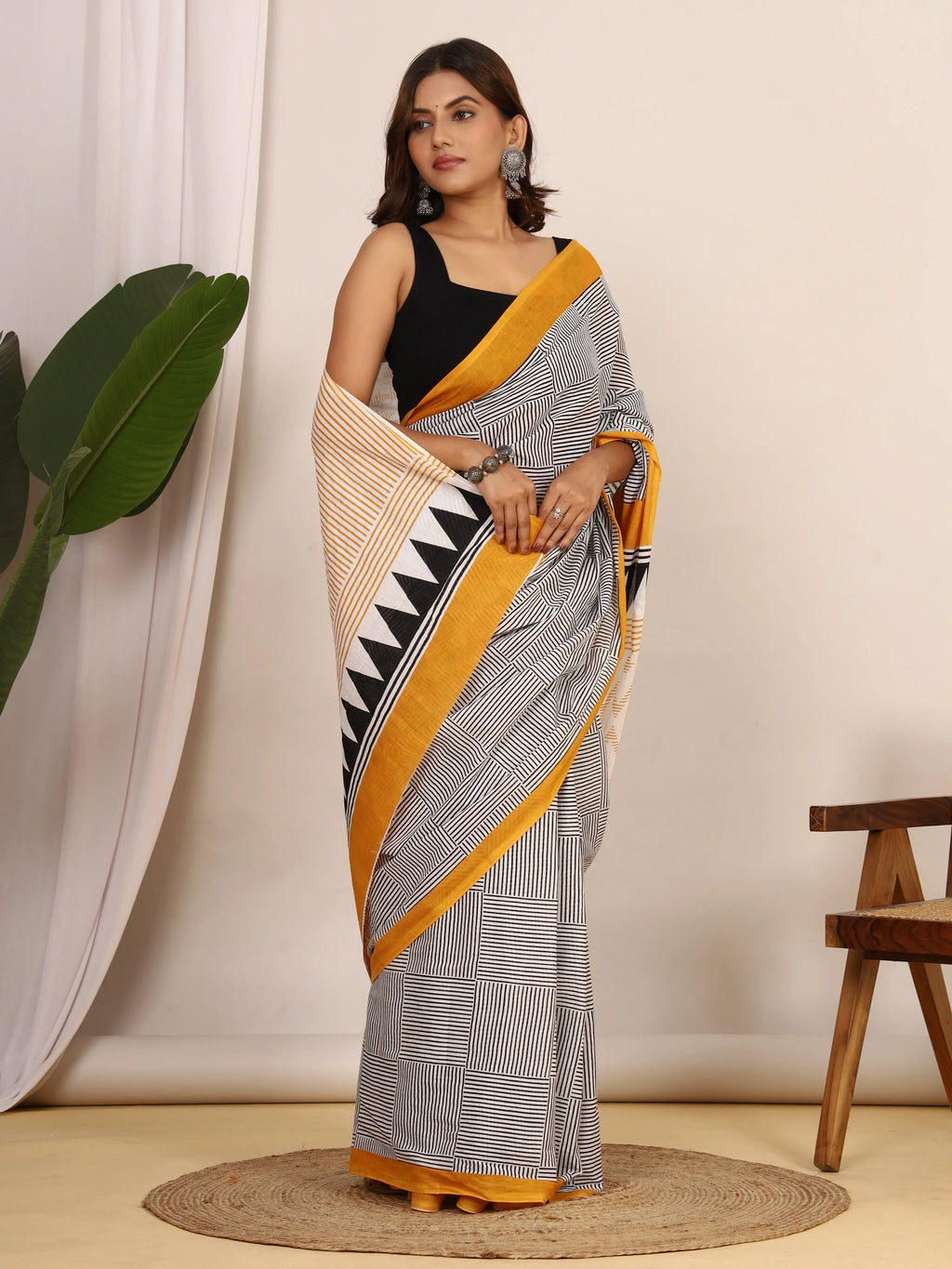 Pure Cotton White and Black Saree with Mustard Accents and Bold Geometric Print