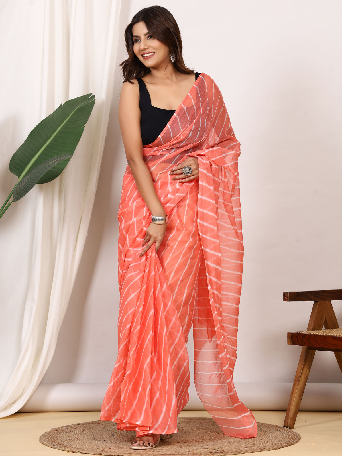 Coral Peach Nazmin Chiffon Saree with Hand Tied Leheriya