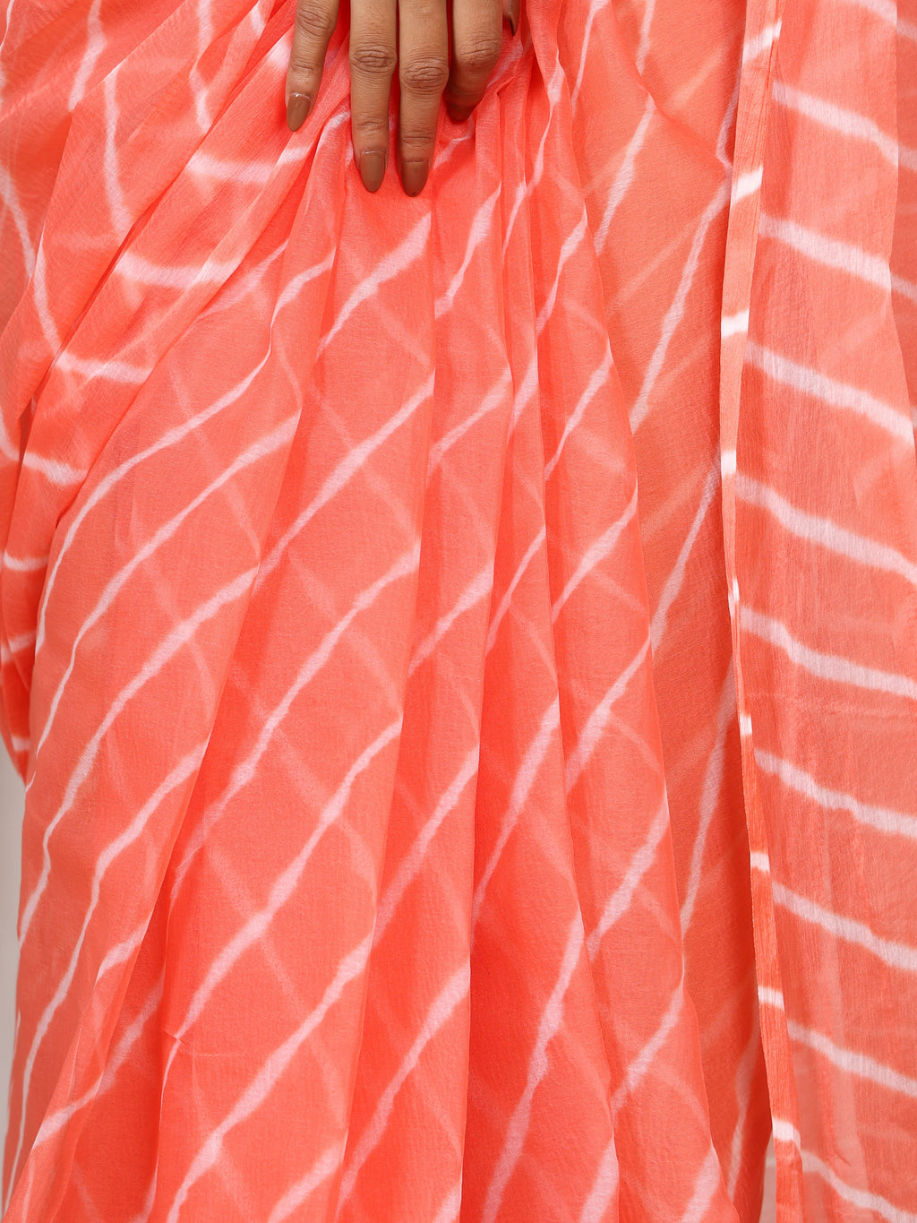 Coral Peach Nazmin Chiffon Saree with Hand Tied Leheriya