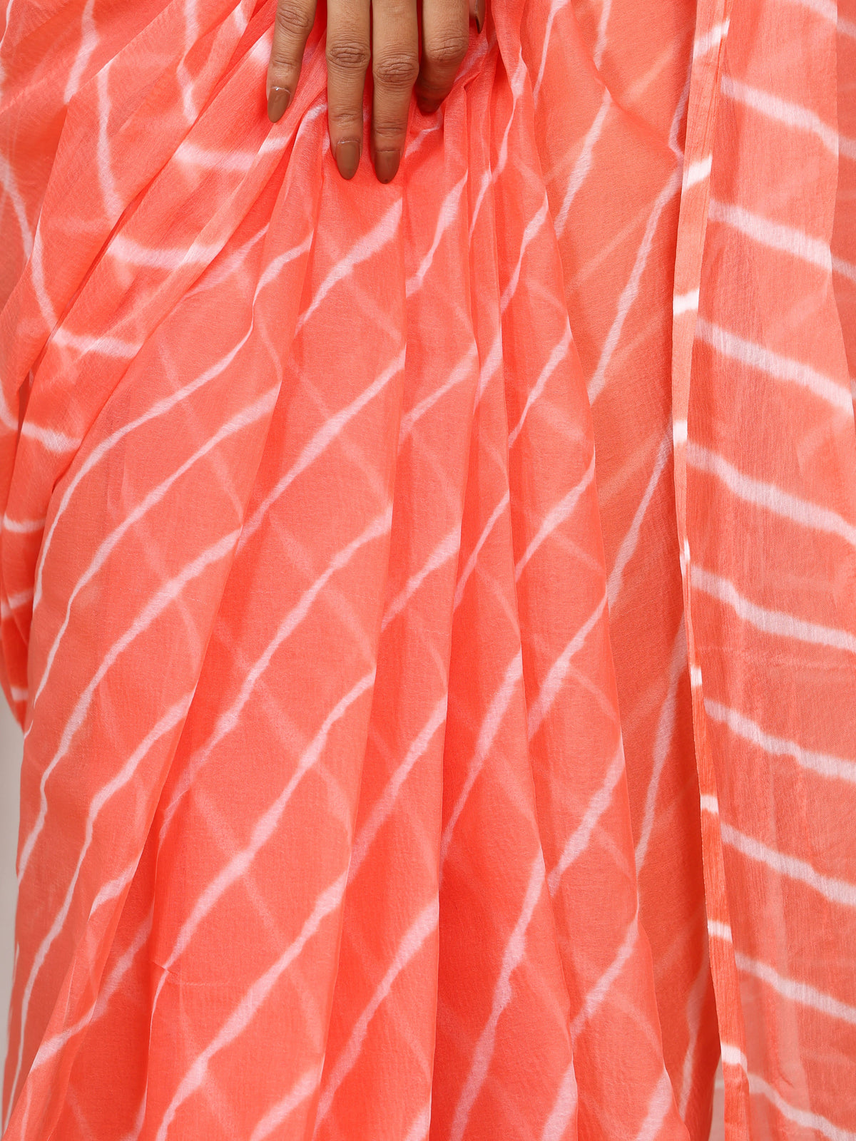 Coral Peach Nazmin Chiffon Saree with Hand Tied Leheriya